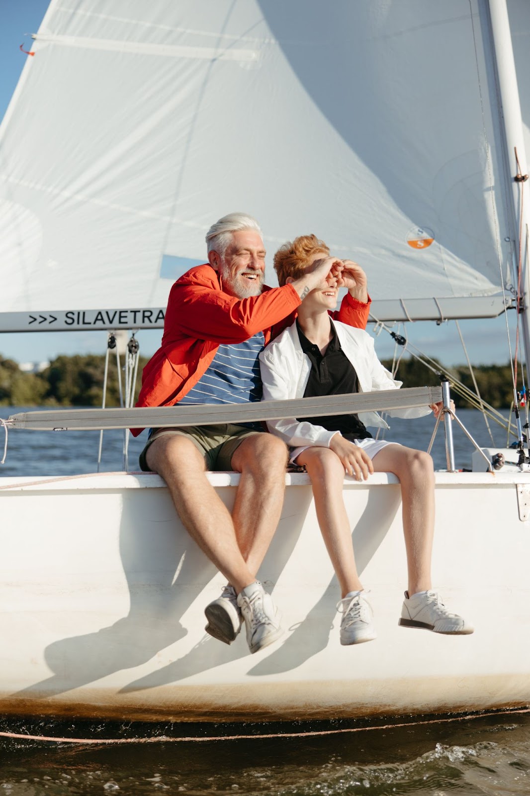 a dad and son moment out at sea